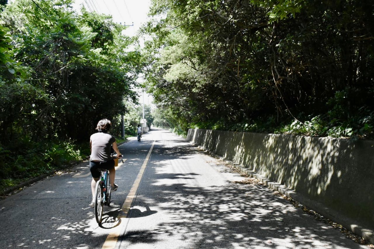 Boasting Emerald Green Waters, A Gem For Water Sports And Onsen, Shikinejima island, Tokyo islands, Izu islands, Tokyo, Japan, cycling, electronic bicycle