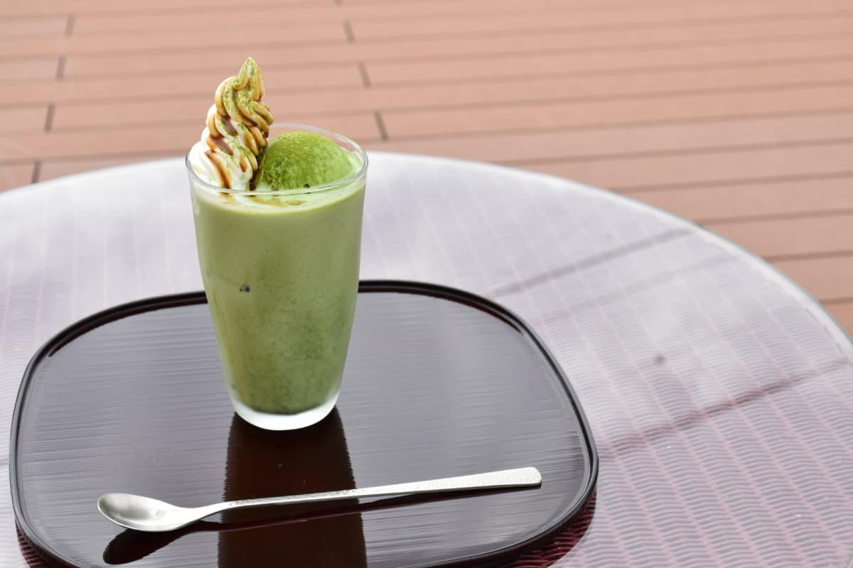 Motomachi Terrace, A Japanese Tea Café where you can savor Japanese tea and local island ingredients, with both indoor and open-air seating available, tokyo, izu islands, izu oshima, japan, hojicha tea mixed with the creamy, exclusive Oshima milk
