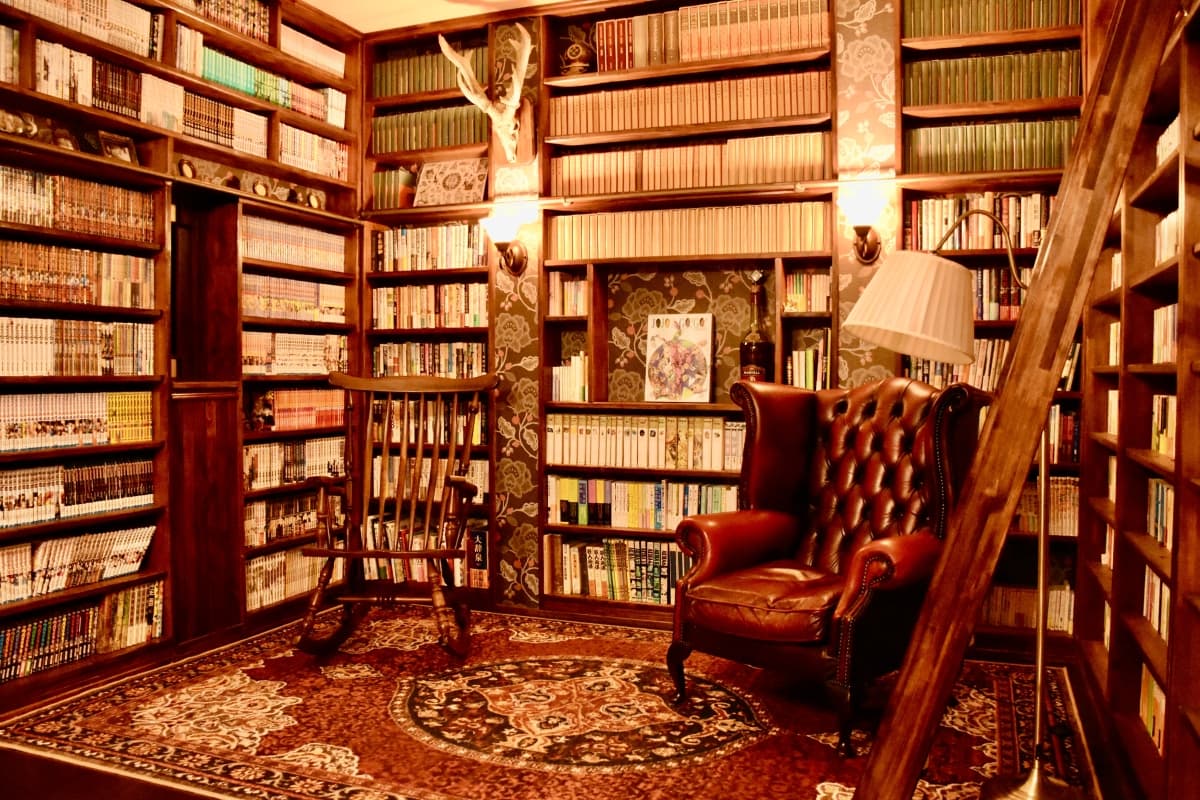 rohan, guest house, living room, habu port, books, beds, futon, Japanese mattress, oshima island, izu oshima, tokyo, japan, tokyo travel, izu islands