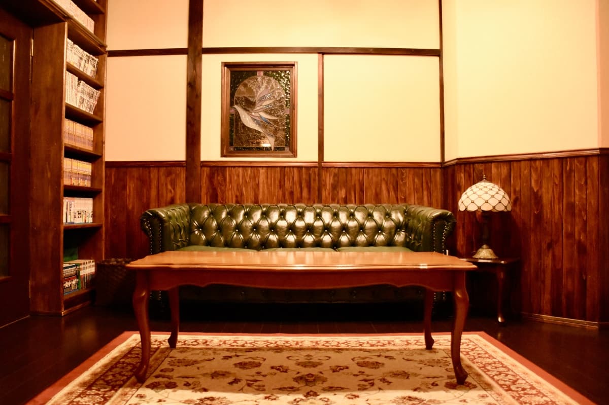 rohan, guest house, living room, habu port, books, beds, futon, Japanese mattress, oshima island, izu oshima, tokyo, japan, tokyo travel, izu islands