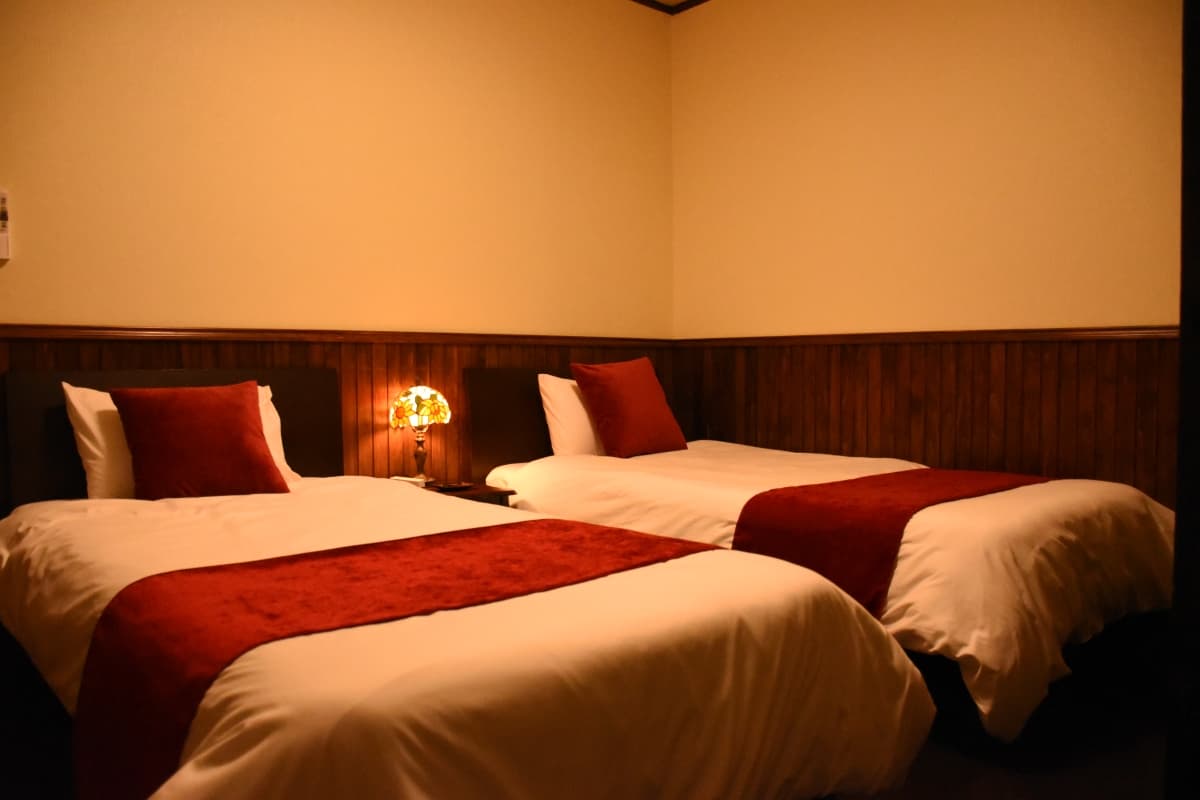 rohan, guest house, guest room, habu port, books, beds, futon, Japanese mattress, oshima island, izu oshima, tokyo, japan, tokyo travel, izu islands